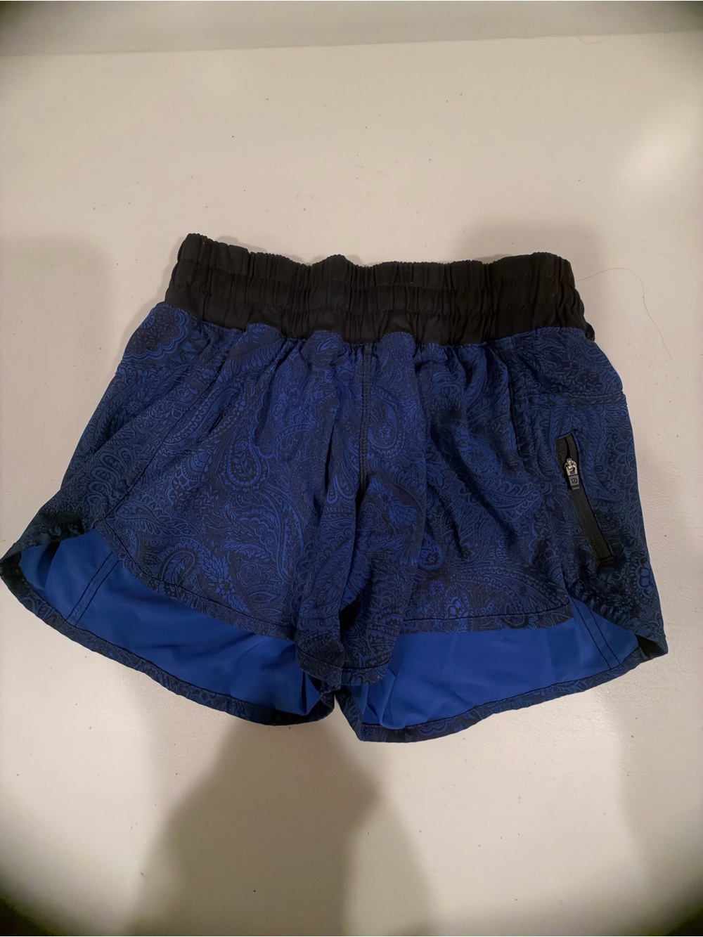 Lululemon running shorts. 2 colors Navy Paisley and Assorted Plaid.